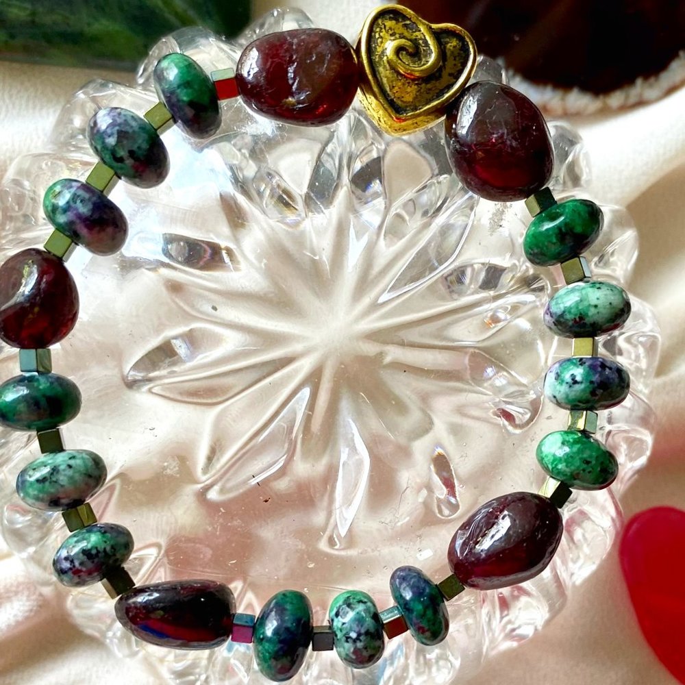 Raw Garnet and Oval Ruby precious stones with a gold in color HEART Bracelet